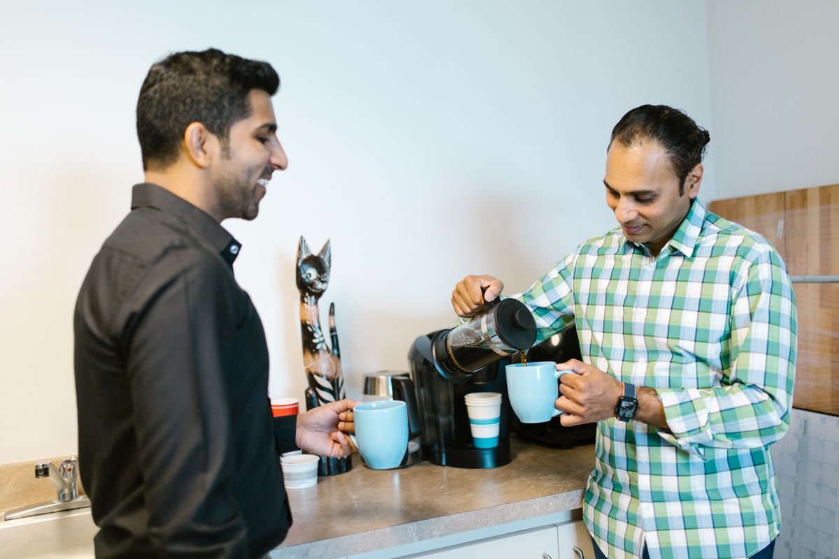 Colleagues taking a coffee break at the office