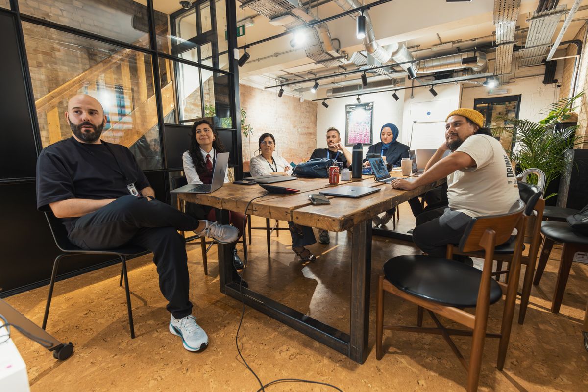 Team in a collaborative meeting in a contemporary office